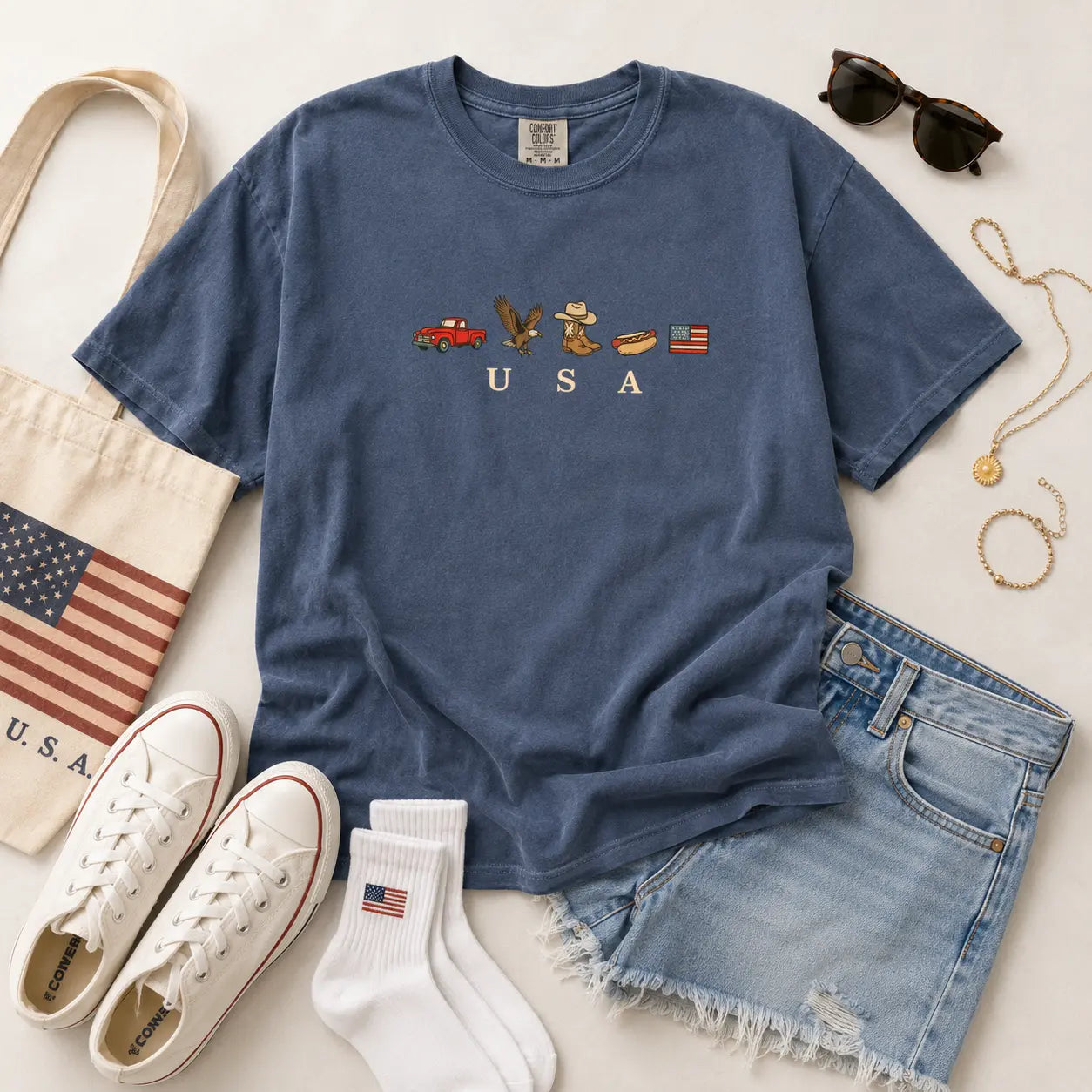 Celebrate Independence Day in Style with the ChicCotton USA Icons Graphic T-Shirt - Vintage Comfort for Every Occasion!